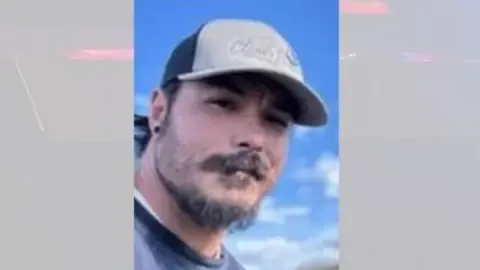 Law enforcement find body they think US man accused of murdering his daughters